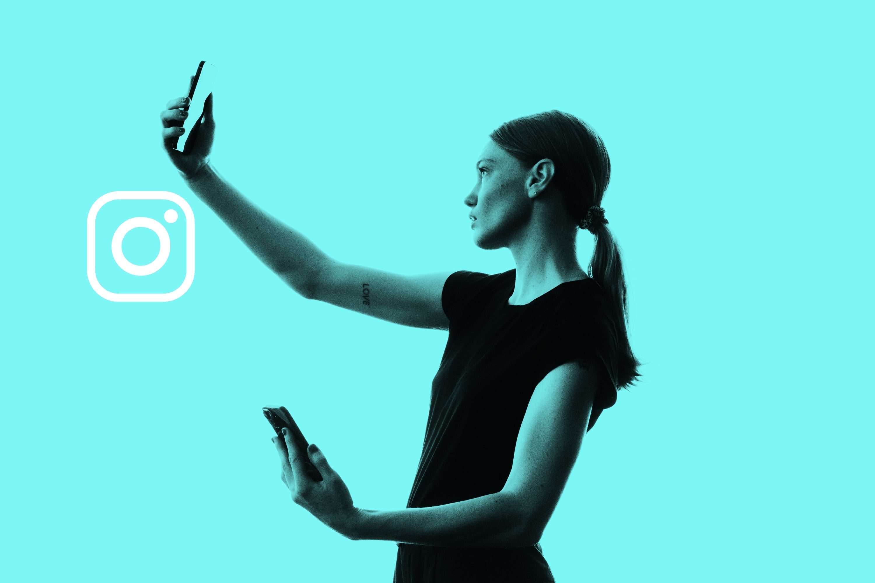 woman taking selfie with instagram teal background