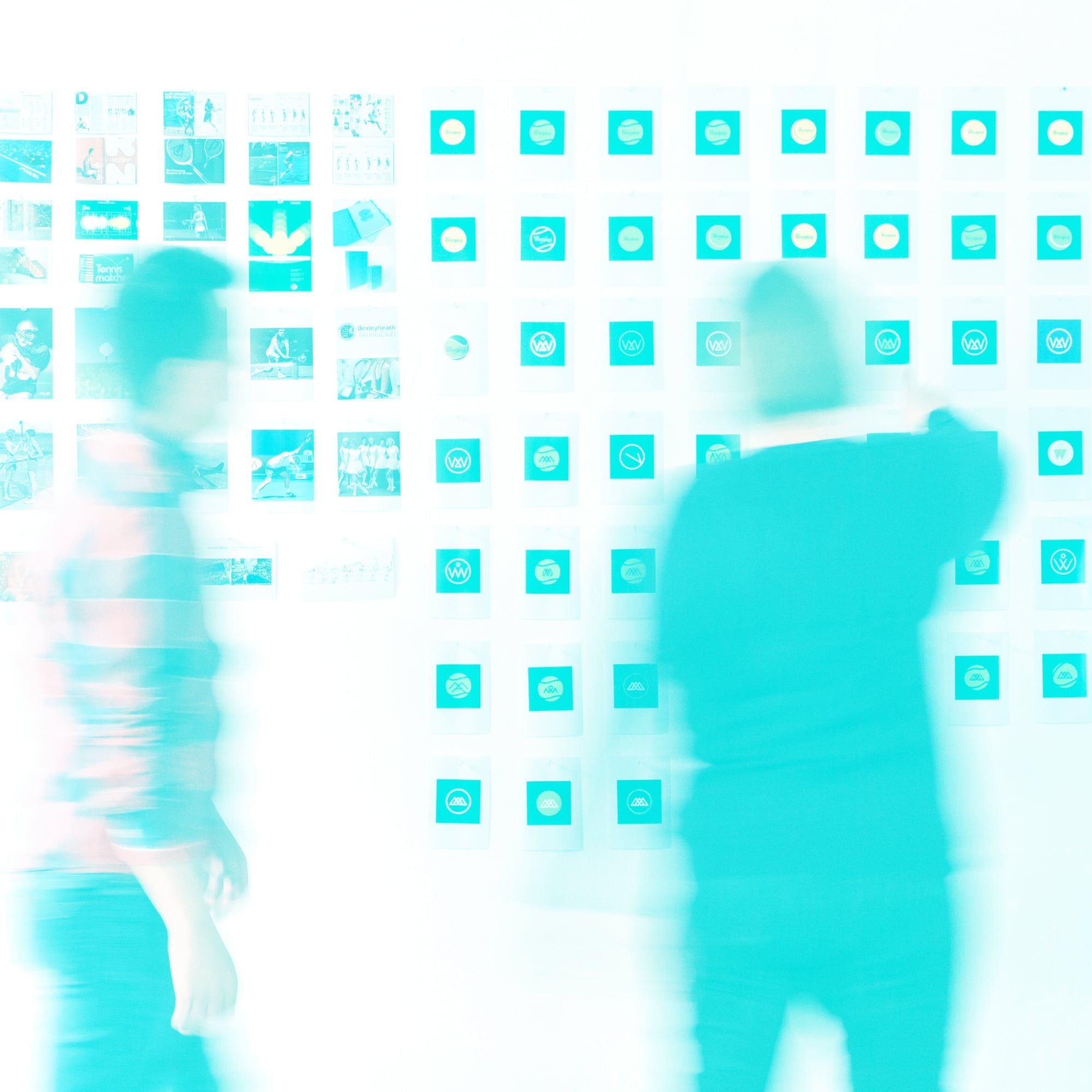 people walking past brand design portfolio wall logo tiles teal