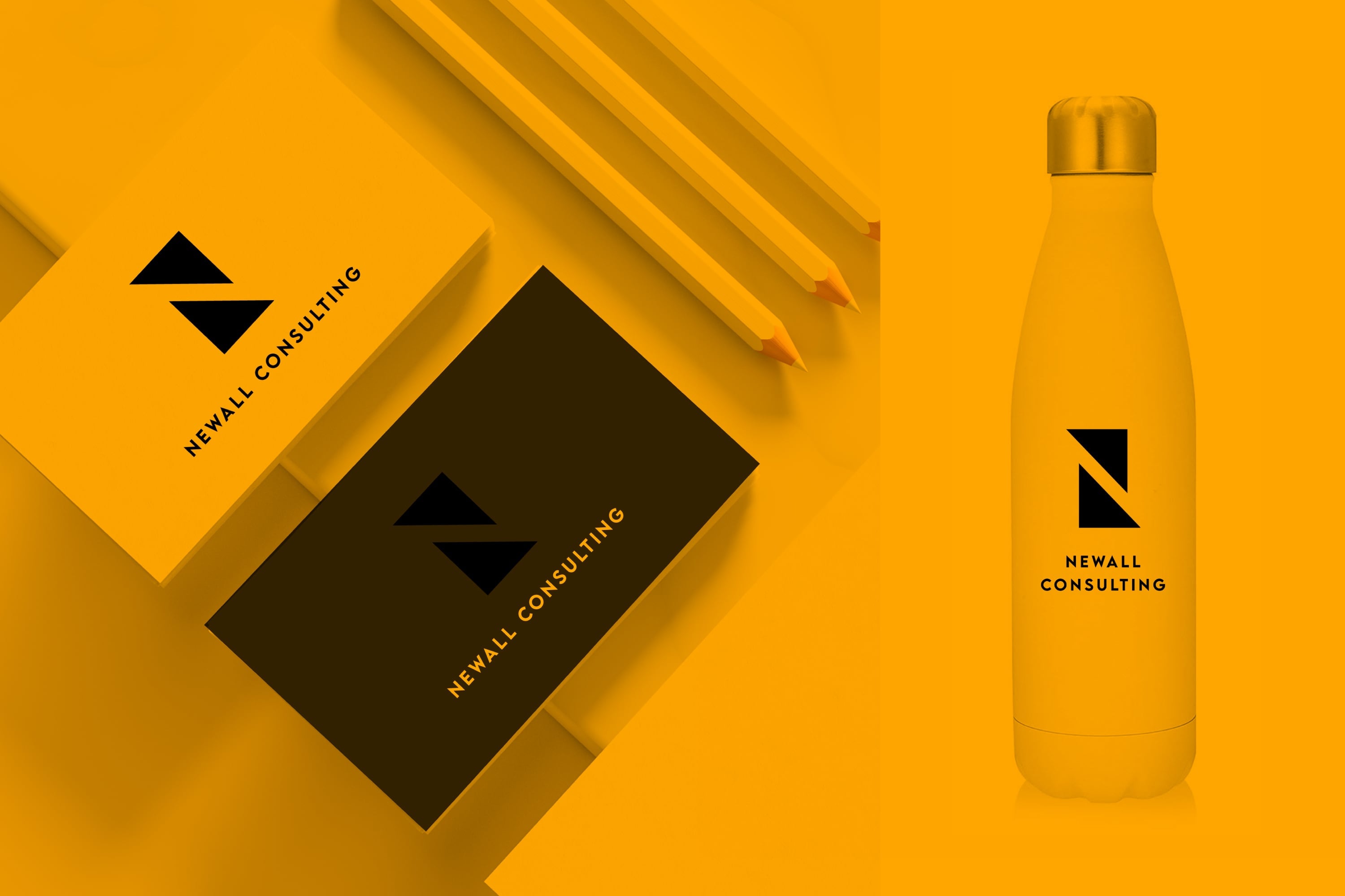 newall consulting brand identity mockup business cards and branded water bottle amber