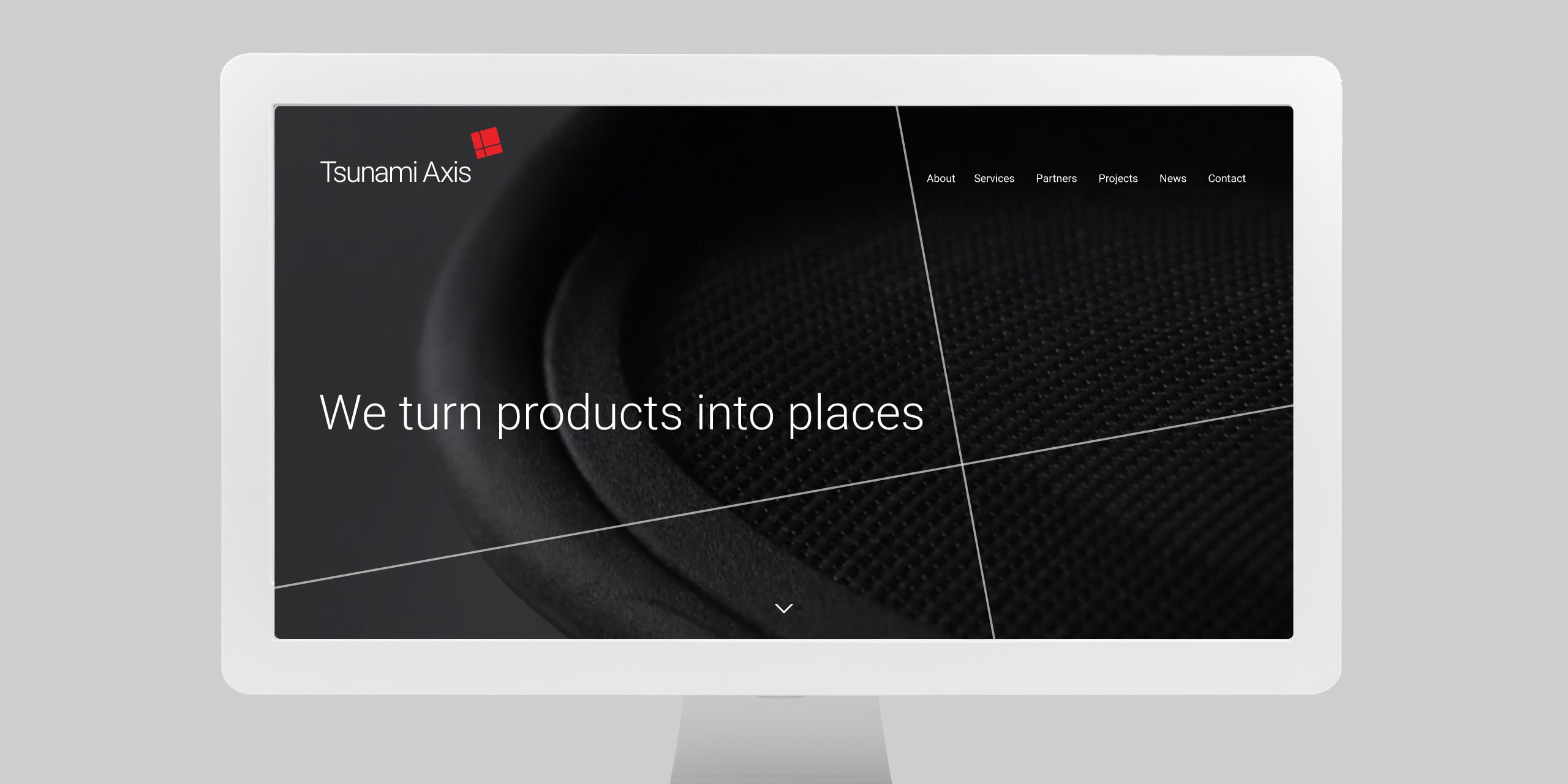 iMac mockup of Tsunami Axis homepage with “We turn products into places” headline
