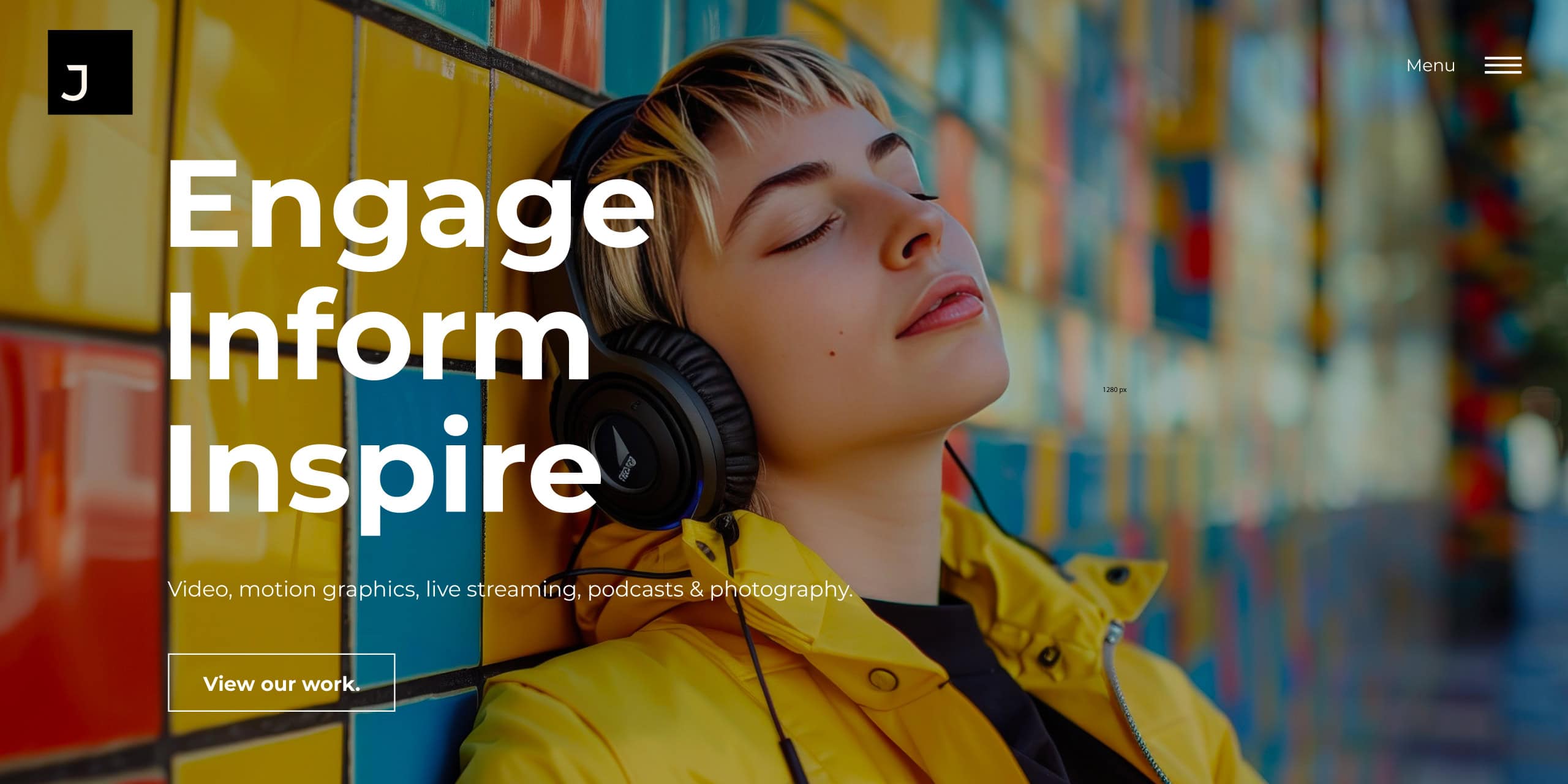 Person in yellow jacket wearing headphones against a colourful tiled wall, with “Engage Inform Inspire” headline