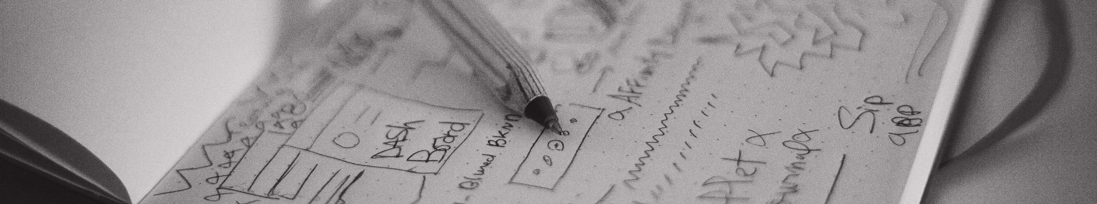 Black and white sketching on notepad during design ideation